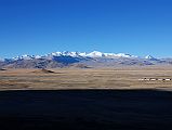 07 Labuche Kang III E and Labuche Kang I Early Morning From Across Tingri Plain The Labuche Kang massif is part of a beautiful mountain panorama viewed to the southwest from Tingri in the early morning. This massif has several summits over 7000m, including Lobuche Kang III East (7250m) in the centre and Labuche Kang (7367m, also called Lobuche Kang I or Choksiam) just to the right of centre.